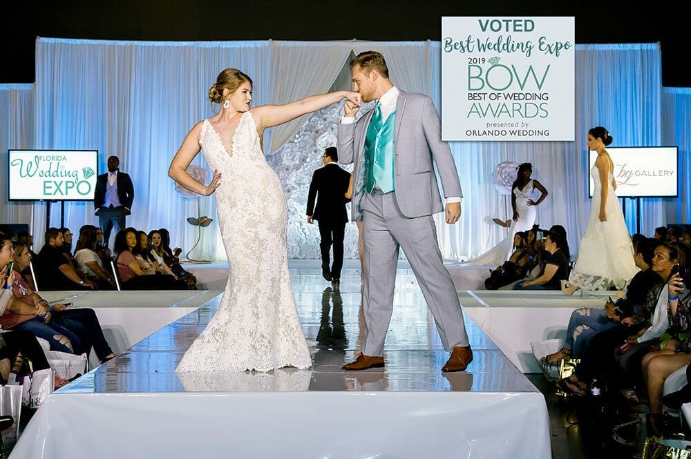 Fashion Show - Lace wedding dress, gray suit with teal vest and tie
