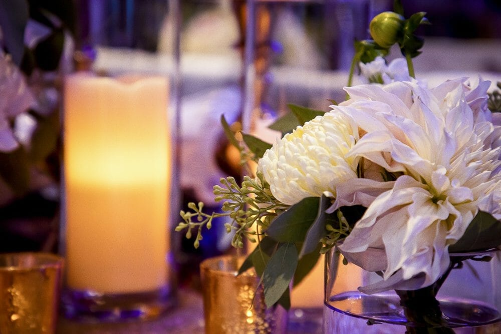 Table display with candles and flowers